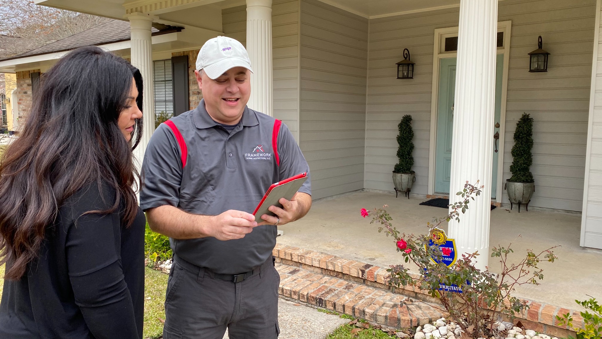 Ryan discussing inspection findings with a client
